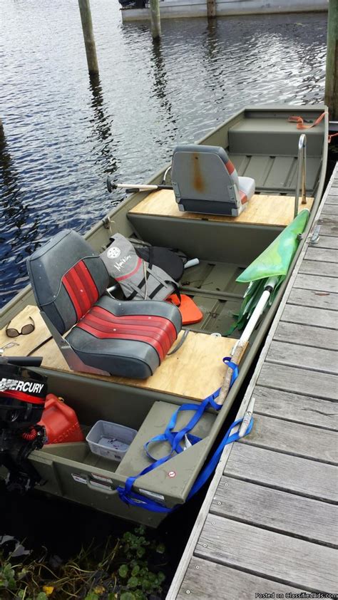 johnson motor and trailer for just $1,800. . 14 ft jon boat for sale